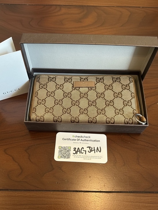 Gucci Handbags - Gucci Beige and Brown GG Supreme Zip Wallet COA included and BoX